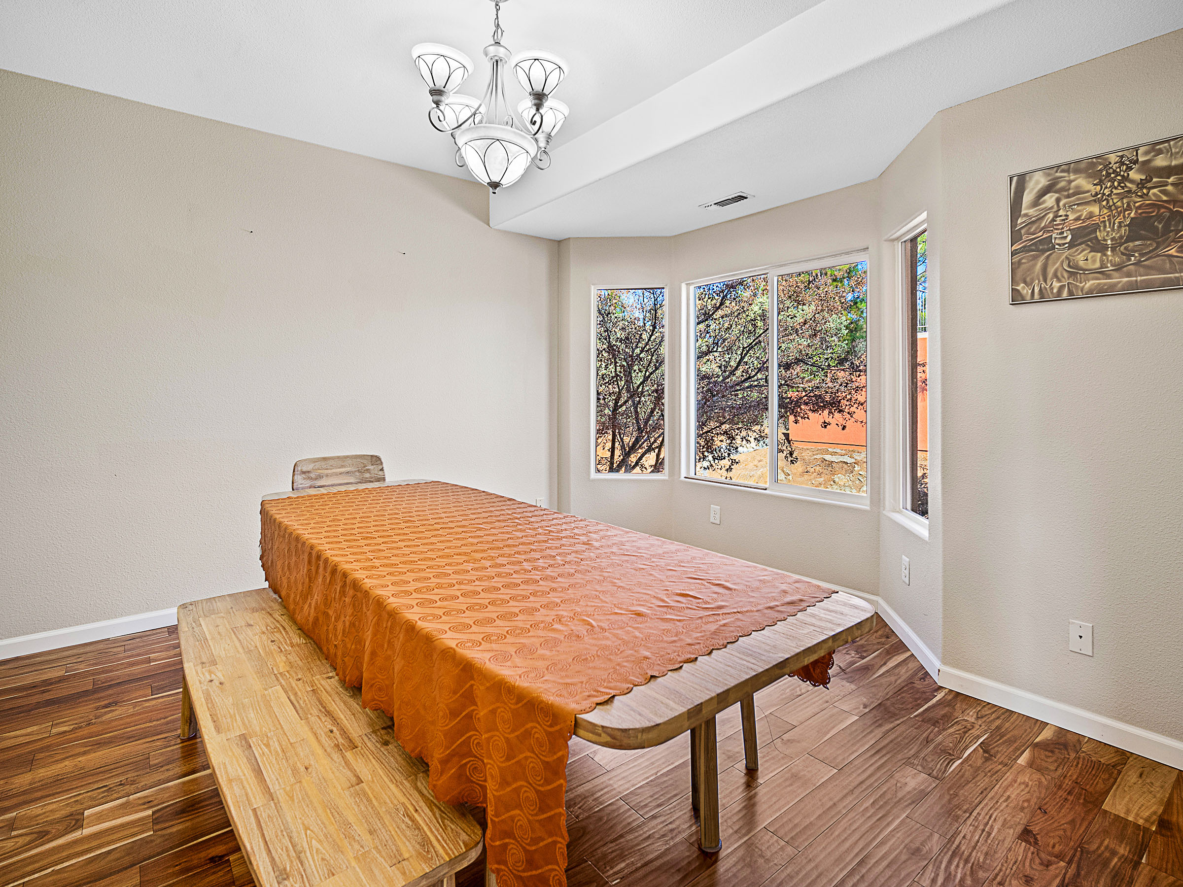 Formal dining room with bay window