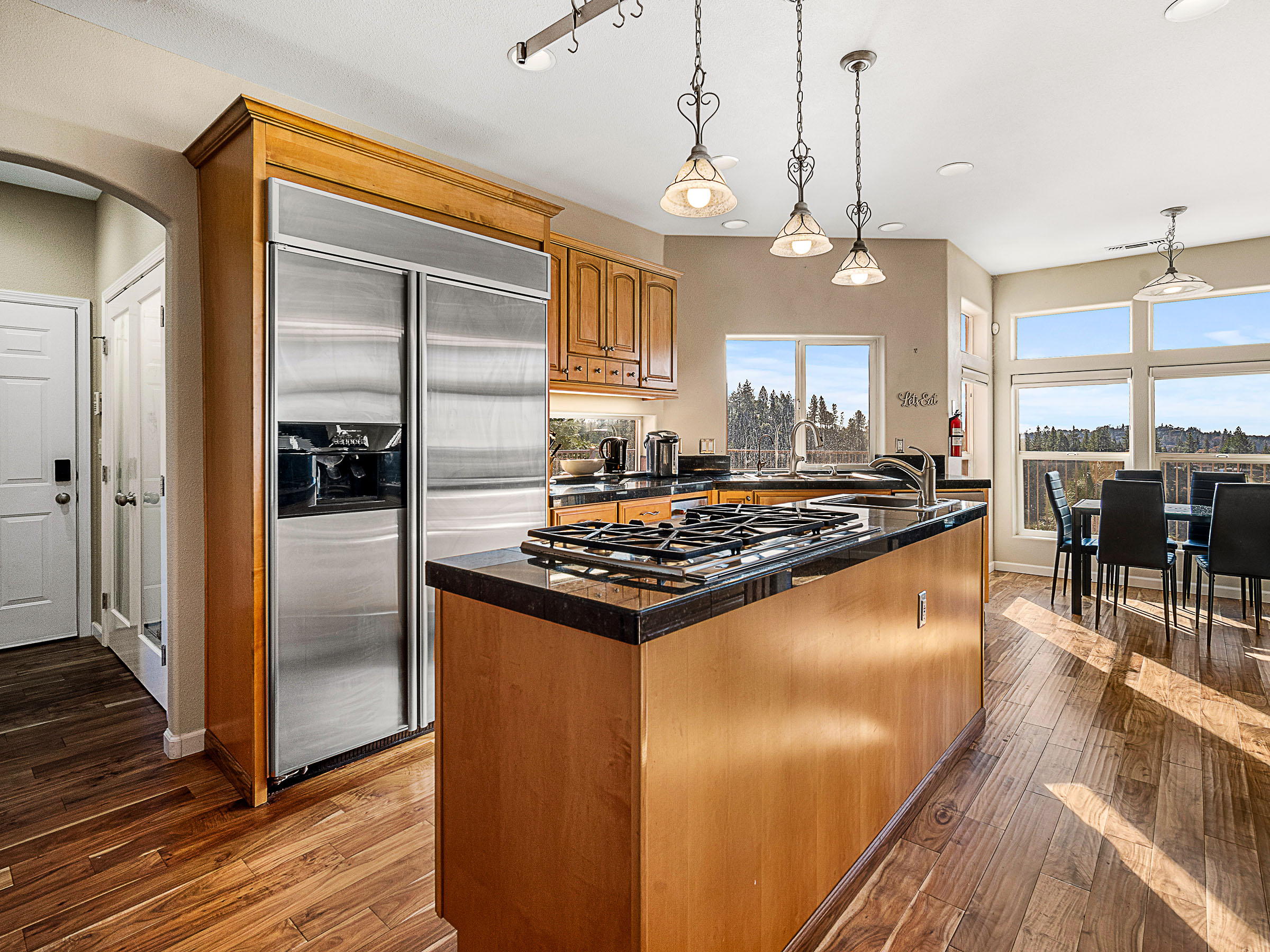 Professional kitchen with extensive cabinetry and workspace